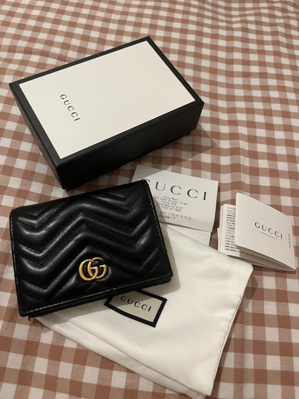 Gucci Black Bi-Fold Wallet with Gold GG